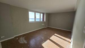 High Rise Two Bedroom Flat — bright 2-bedroom flat built in 1967 with balcony off the kitchen, lift access, and on-site parking, ideal for film shoots.