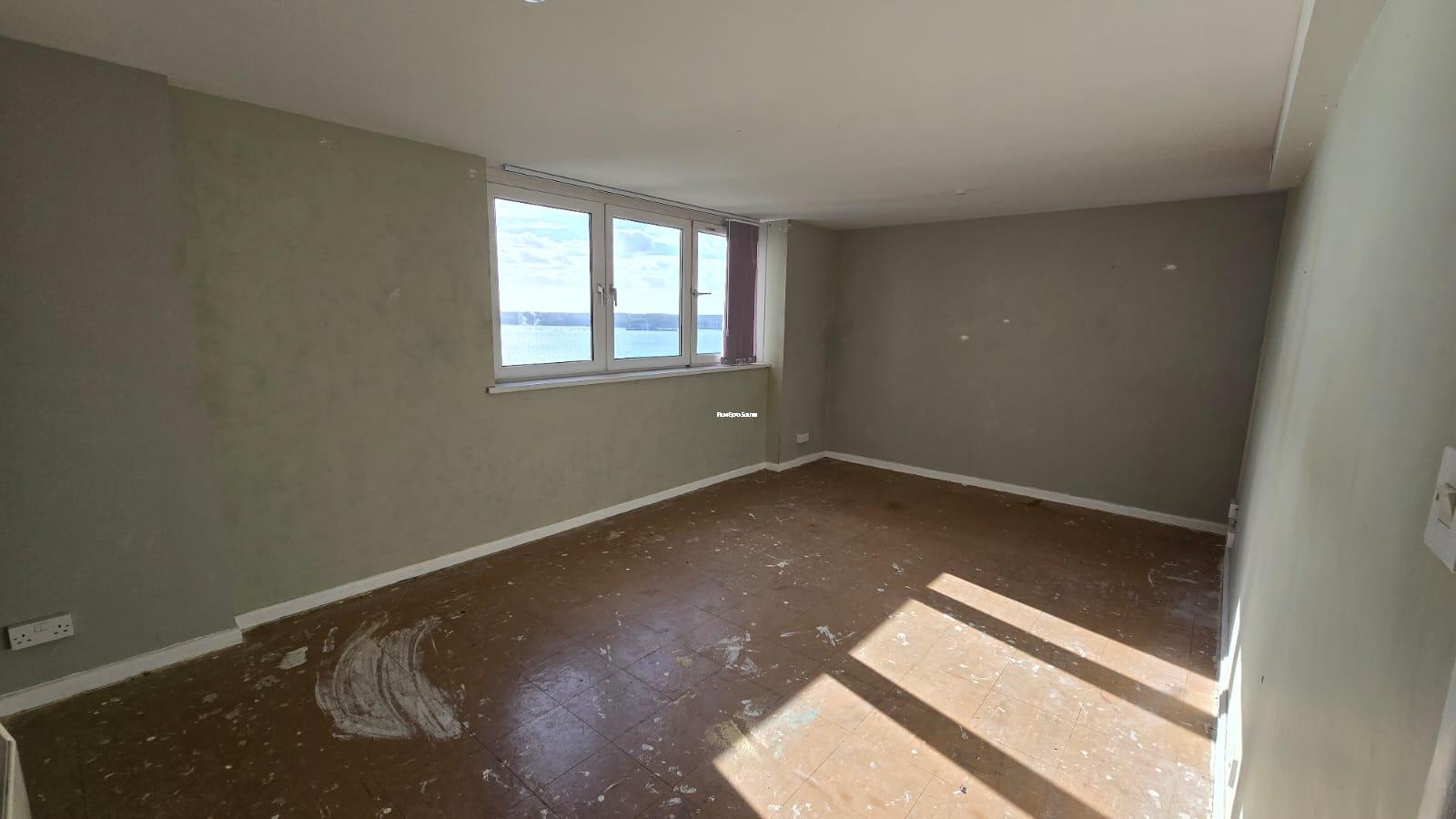 High Rise Two Bedroom Flat — bright 2-bedroom flat built in 1967 with balcony off the kitchen, lift access, and on-site parking, ideal for film shoots.